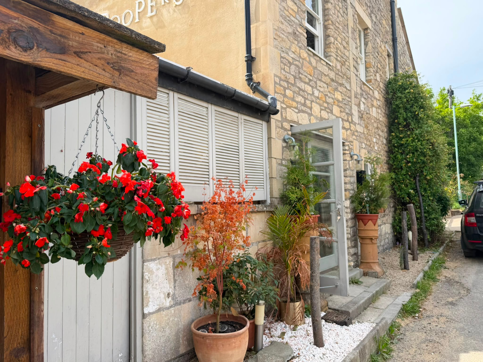 Flower-filled entrance to the cottage